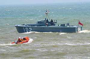 MTB 102  heads for Sandwich escorted by Walmer Lifeboat (photo: Gerry Costa)