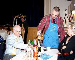 Rotarian "waiters" for international meal.