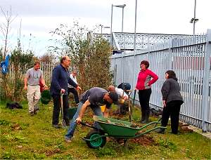 Volunteers transformimg Deal Station waste ground (photo: Steve Wakeford)